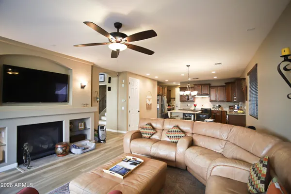 a room with furniture and a flat screen tv