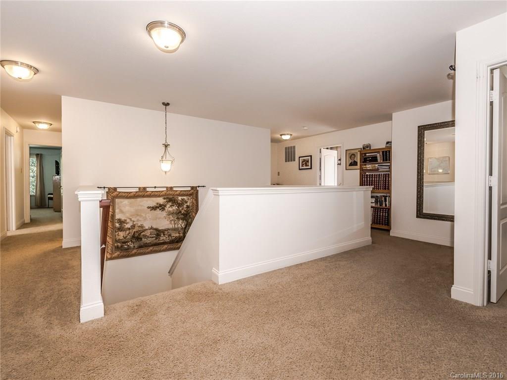 2074 Durand Road, Unit 18 Fort Mill, SC 29715 - Photo 13 of 24 an empty room with closet and mirrors