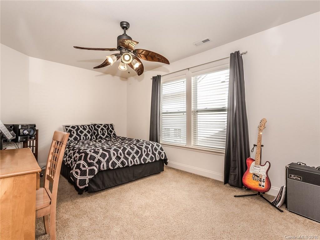 2074 Durand Road, Unit 18 Fort Mill, SC 29715 - Photo 16 of 24 a bedroom with bed and window