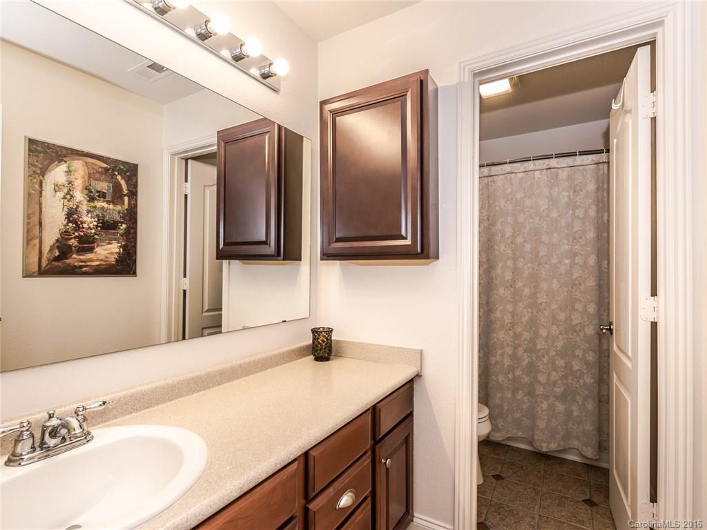 2074 Durand Road, Unit 18 Fort Mill, SC 29715 - Photo 18 of 24 a bathroom with a sink and a mirror