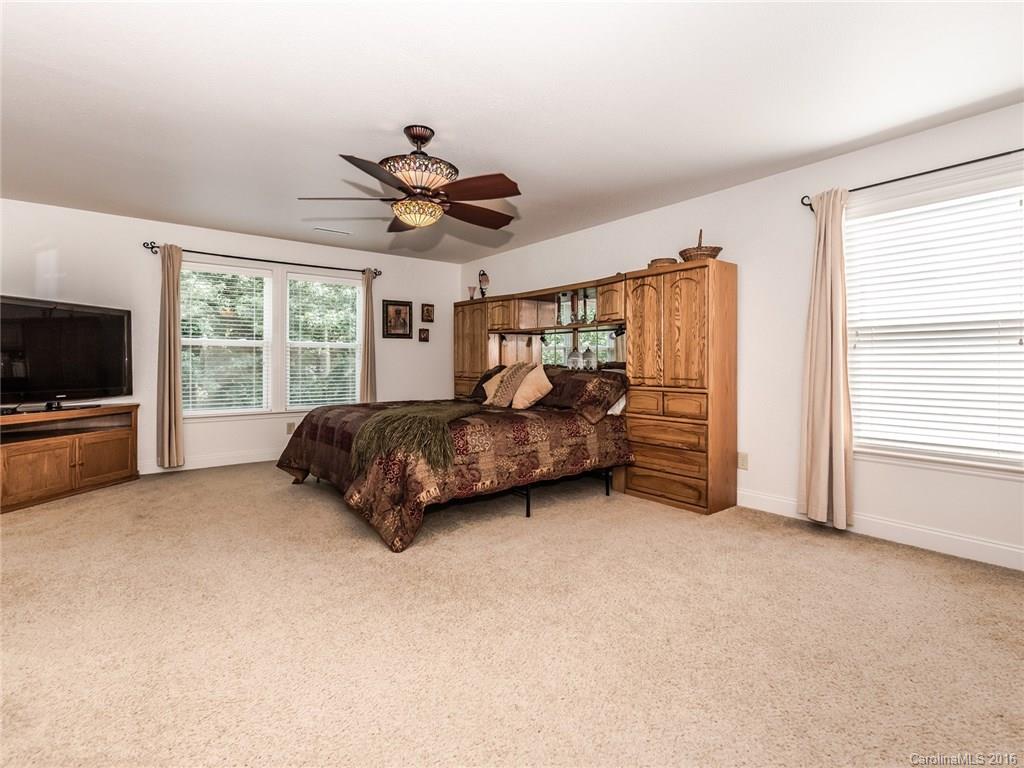 2074 Durand Road, Unit 18 Fort Mill, SC 29715 - Photo 19 of 24 a living room with furniture and a flat screen tv