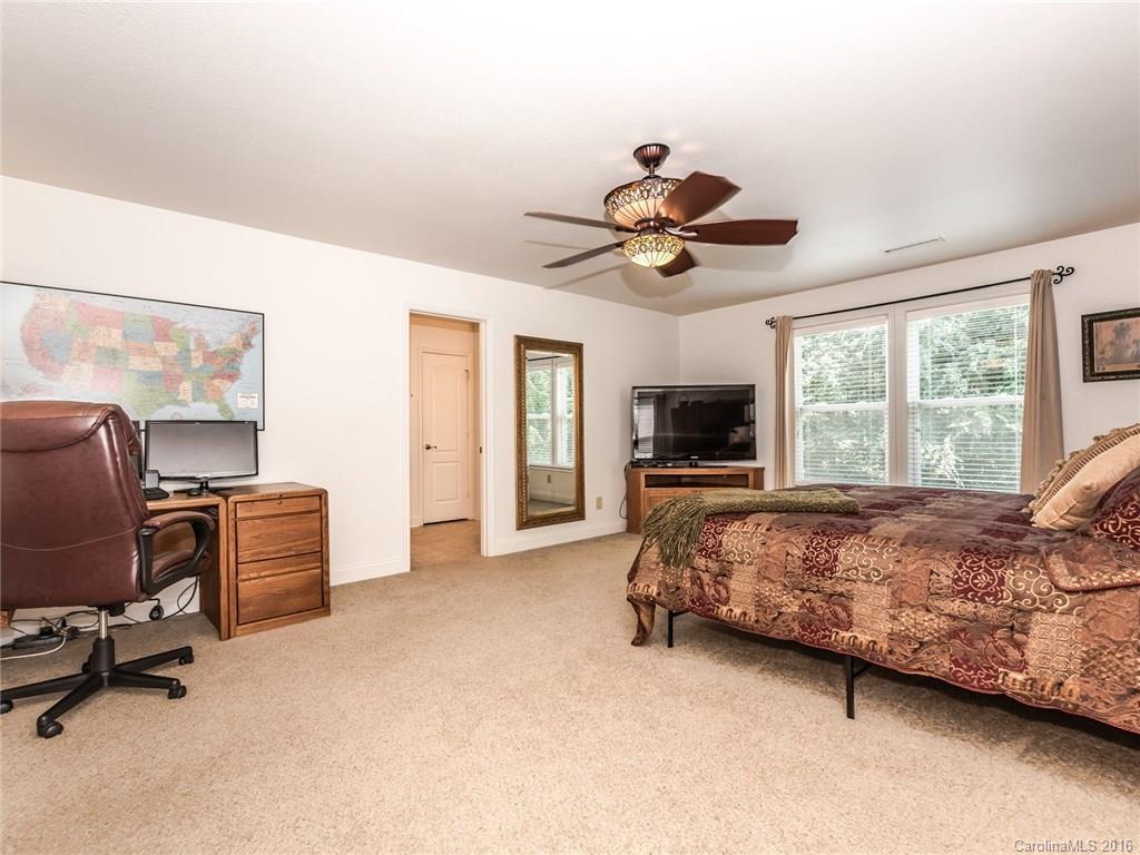 2074 Durand Road, Unit 18 Fort Mill, SC 29715 - Photo 20 of 24 a view of a livingroom with workspace and a window