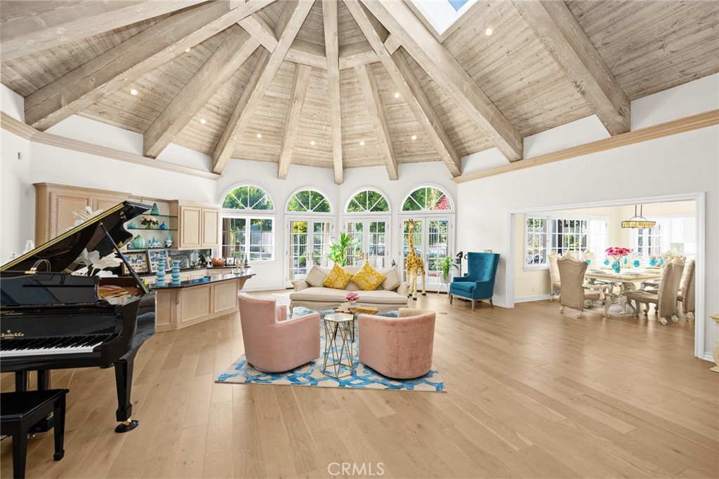 1531 Rodeo Road Arcadia, CA 91006 - Photo 11 of 34 a living room with furniture a fireplace and large windows