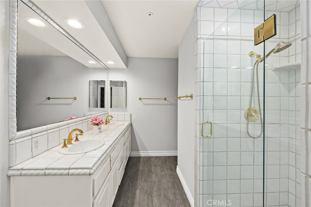 1531 Rodeo Road Arcadia, CA 91006 - Photo 20 of 34 a bathroom with a tub sink and mirror