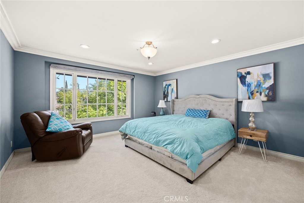 1531 Rodeo Road Arcadia, CA 91006 - Photo 23 of 34 a spacious bedroom with a bed and a couch