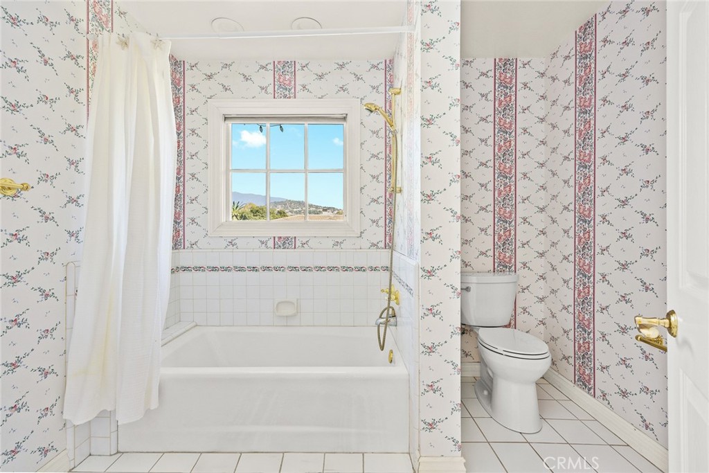 1531 Rodeo Road Arcadia, CA 91006 - Photo 24 of 34 a bathroom with a toilet and a bathtub