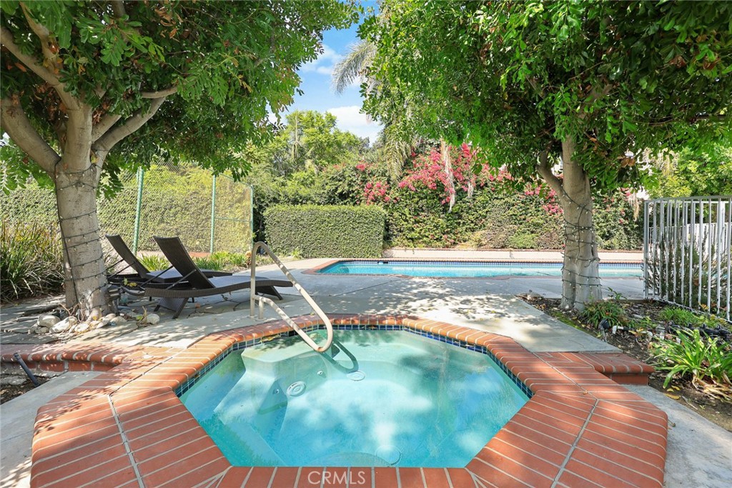 1531 Rodeo Road Arcadia, CA 91006 - Photo 26 of 34 a view of a swimming pool with a sitting space