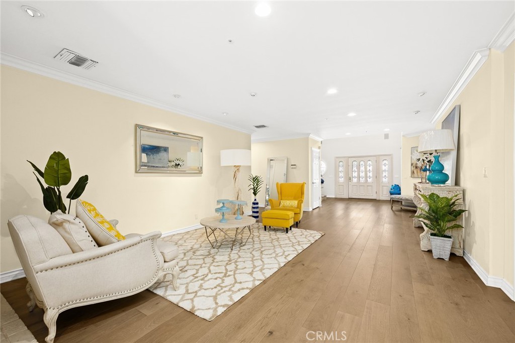 1531 Rodeo Road Arcadia, CA 91006 - Photo 7 of 34 a living room with furniture and a wooden floor