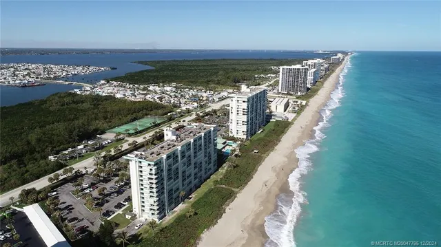 a kitchen with a stove and a desk