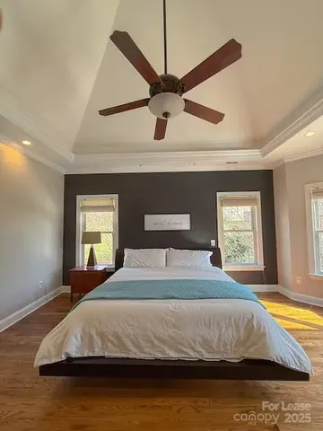 a bathroom with a double vanity sink mirror and bathtub