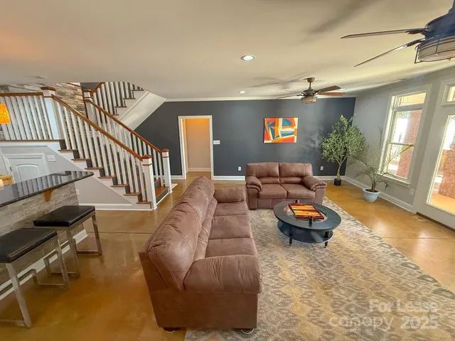 a view of a patio with couches table and chairs