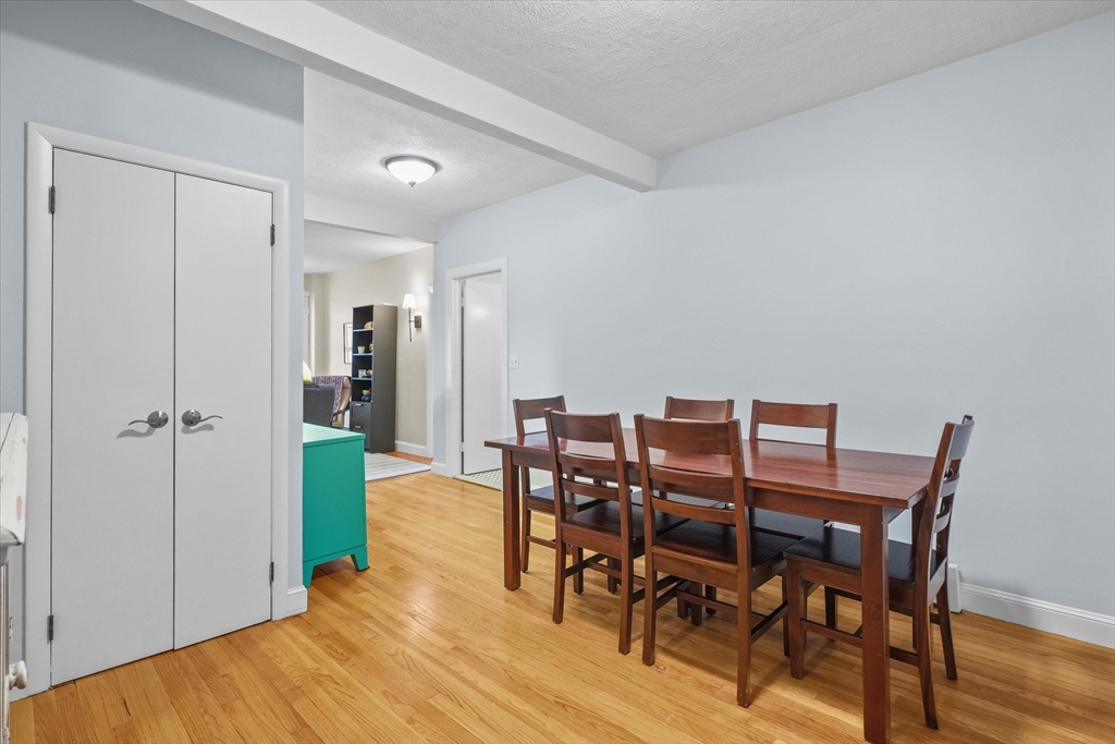201 Humphrey Street, Unit 2 Marblehead, MA 01945 - Photo 8 of 33 a view of a dining room with furniture