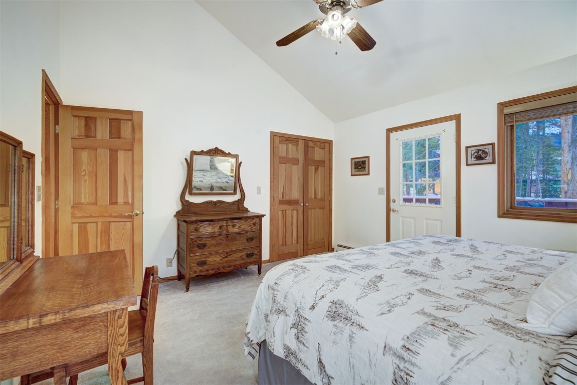 3824 Ski Hill Road Breckenridge, CO 80424 - Photo 20 of 47 a bedroom with a bed and wooden floor