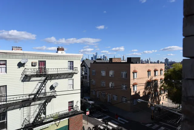 a view of a chairs and table in a patio