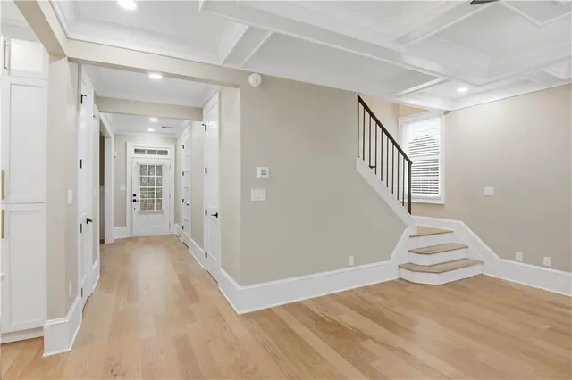 a view of an empty room with a fireplace