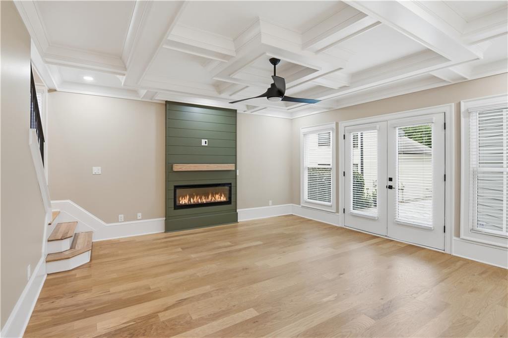 3842 Memphis Drive Suwanee, GA 30024 - Photo 15 of 63 a view of an empty room with a fireplace