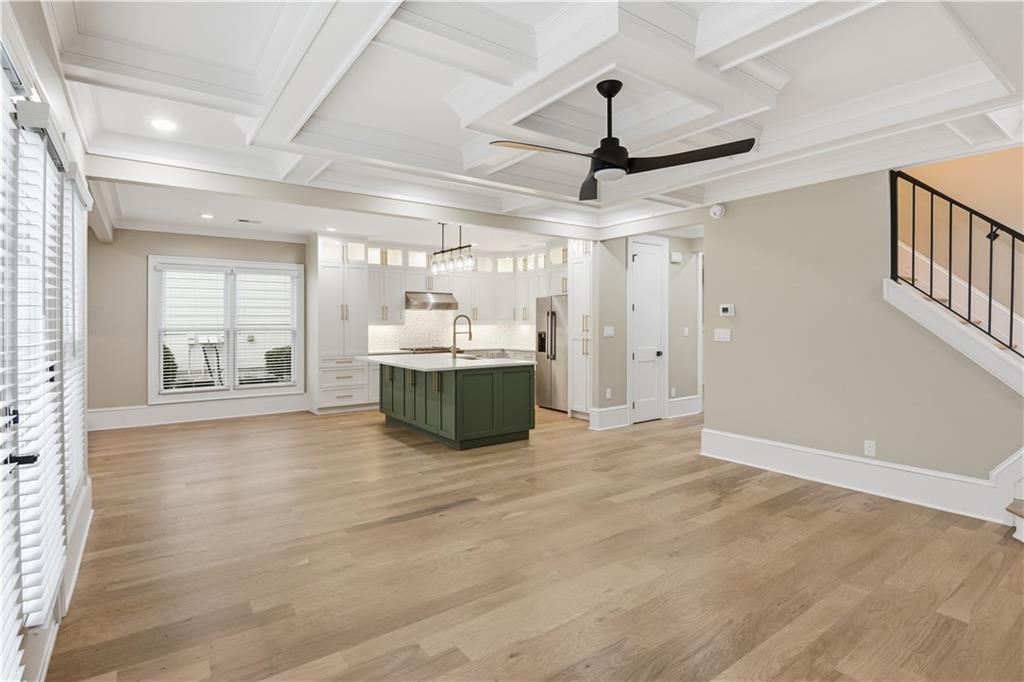 3842 Memphis Drive Suwanee, GA 30024 - Photo 16 of 63 a view of an empty room with window and cabinet