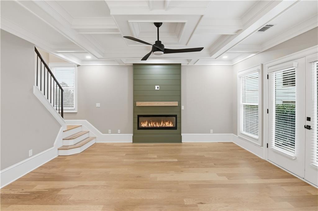 3842 Memphis Drive Suwanee, GA 30024 - Photo 18 of 63 a view of an empty room with a fireplace