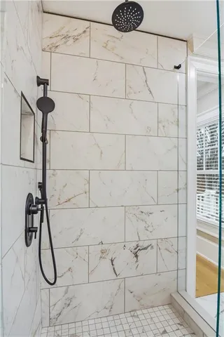 an aerial view of a house with yard swimming pool and outdoor seating