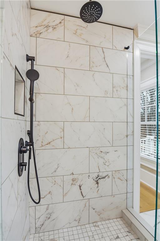 3842 Memphis Drive Suwanee, GA 30024 - Photo 29 of 63 a bathroom with a shower