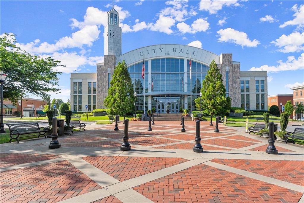 3842 Memphis Drive Suwanee, GA 30024 - Photo 38 of 63 a view of a yard in front of a building