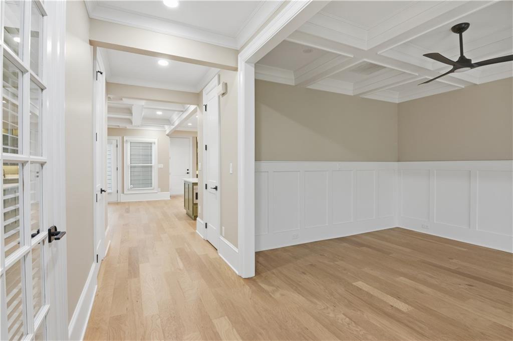 3842 Memphis Drive Suwanee, GA 30024 - Photo 4 of 63 a view of a hallway with wooden floor