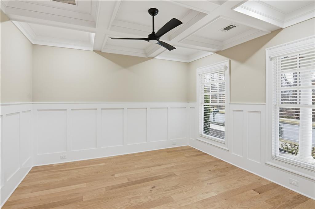 3842 Memphis Drive Suwanee, GA 30024 - Photo 5 of 63 a view of empty room with wooden floor and fan