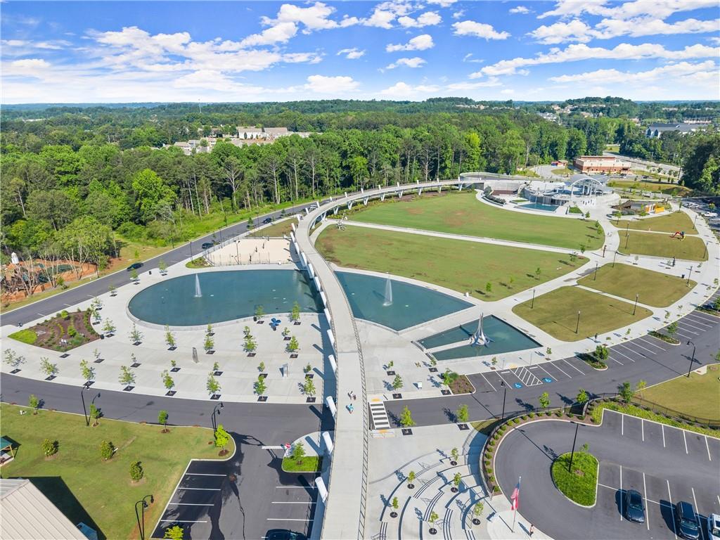3842 Memphis Drive Suwanee, GA 30024 - Photo 54 of 63 a view of a swimming pool with a patio