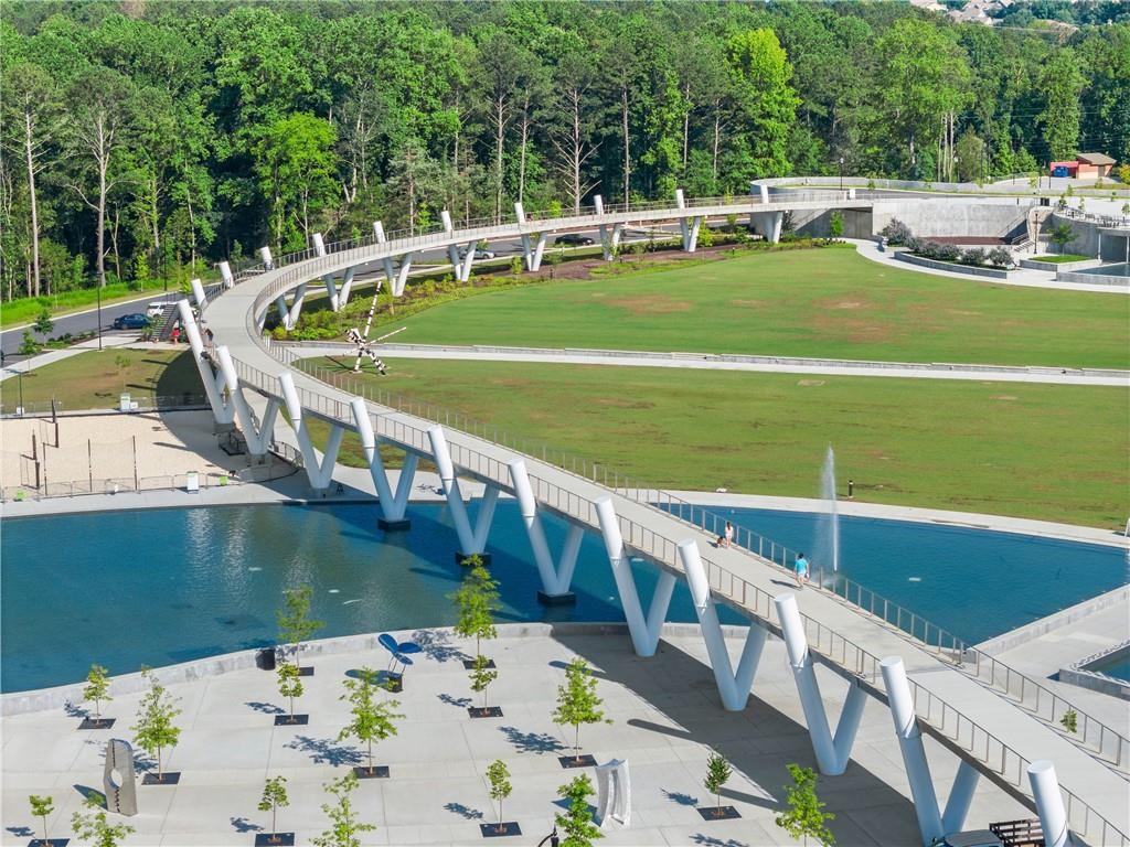 3842 Memphis Drive Suwanee, GA 30024 - Photo 55 of 63 a view of a swimming pool with a patio