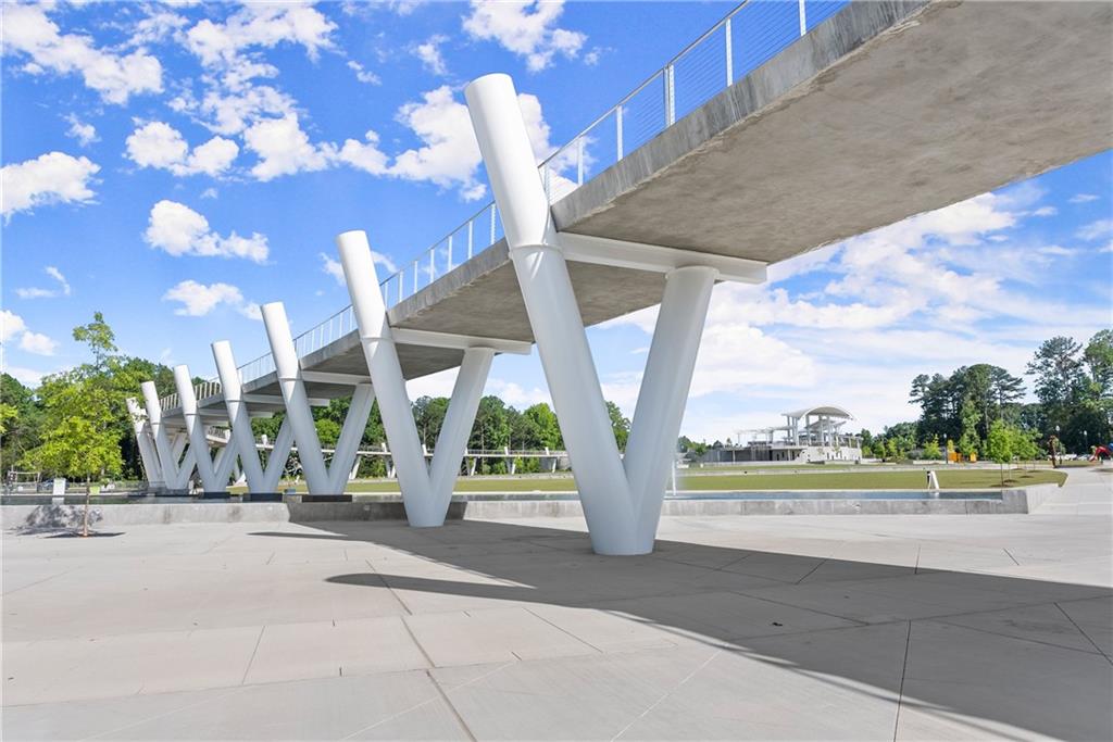 3842 Memphis Drive Suwanee, GA 30024 - Photo 60 of 63 a front view of a building with tree s