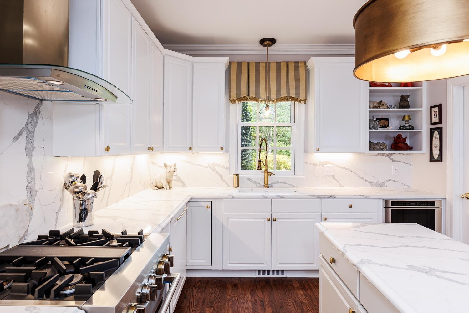 3359 Ridgecrest Court Raleigh, NC 27607 - Photo 14 of 37 a kitchen with a stove and a sink
