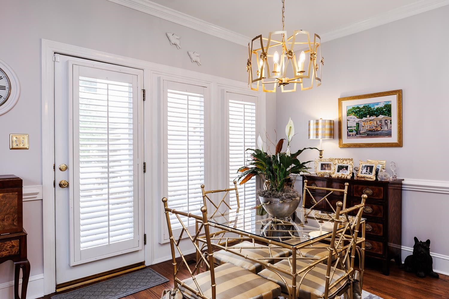 3359 Ridgecrest Court Raleigh, NC 27607 - Photo 18 of 37 a view of a dining room with furniture wooden floor and chandelier