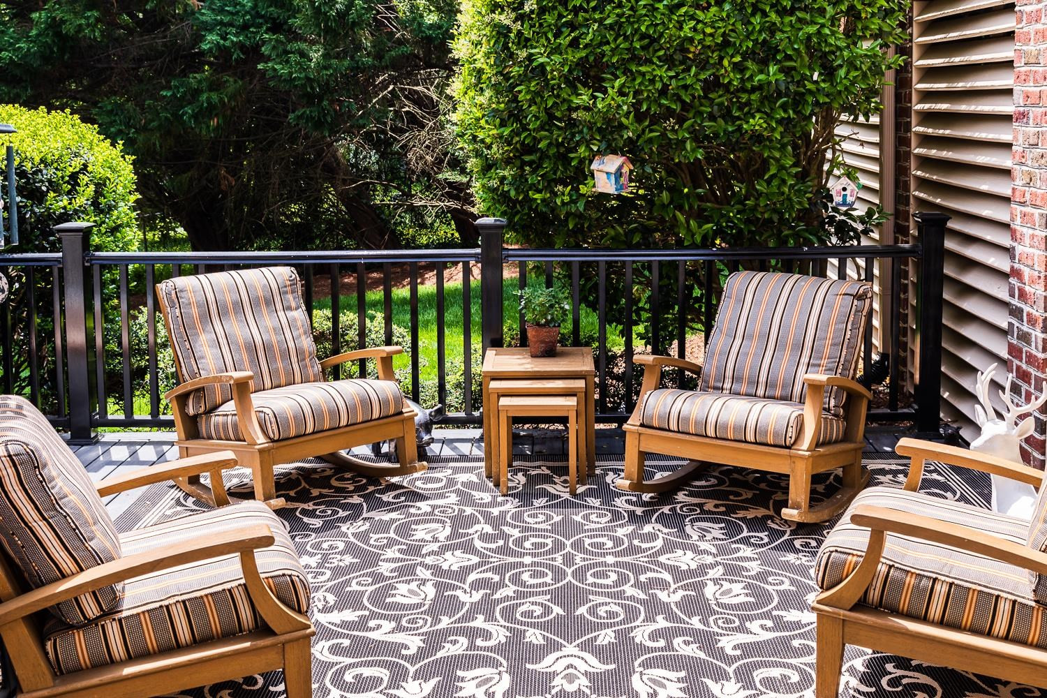 3359 Ridgecrest Court Raleigh, NC 27607 - Photo 33 of 37 a view of a patio with two couches chairs and wooden floor