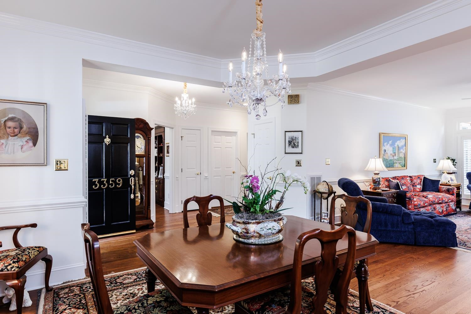 3359 Ridgecrest Court Raleigh, NC 27607 - Photo 5 of 37 a view of a dining room with furniture and chandelier