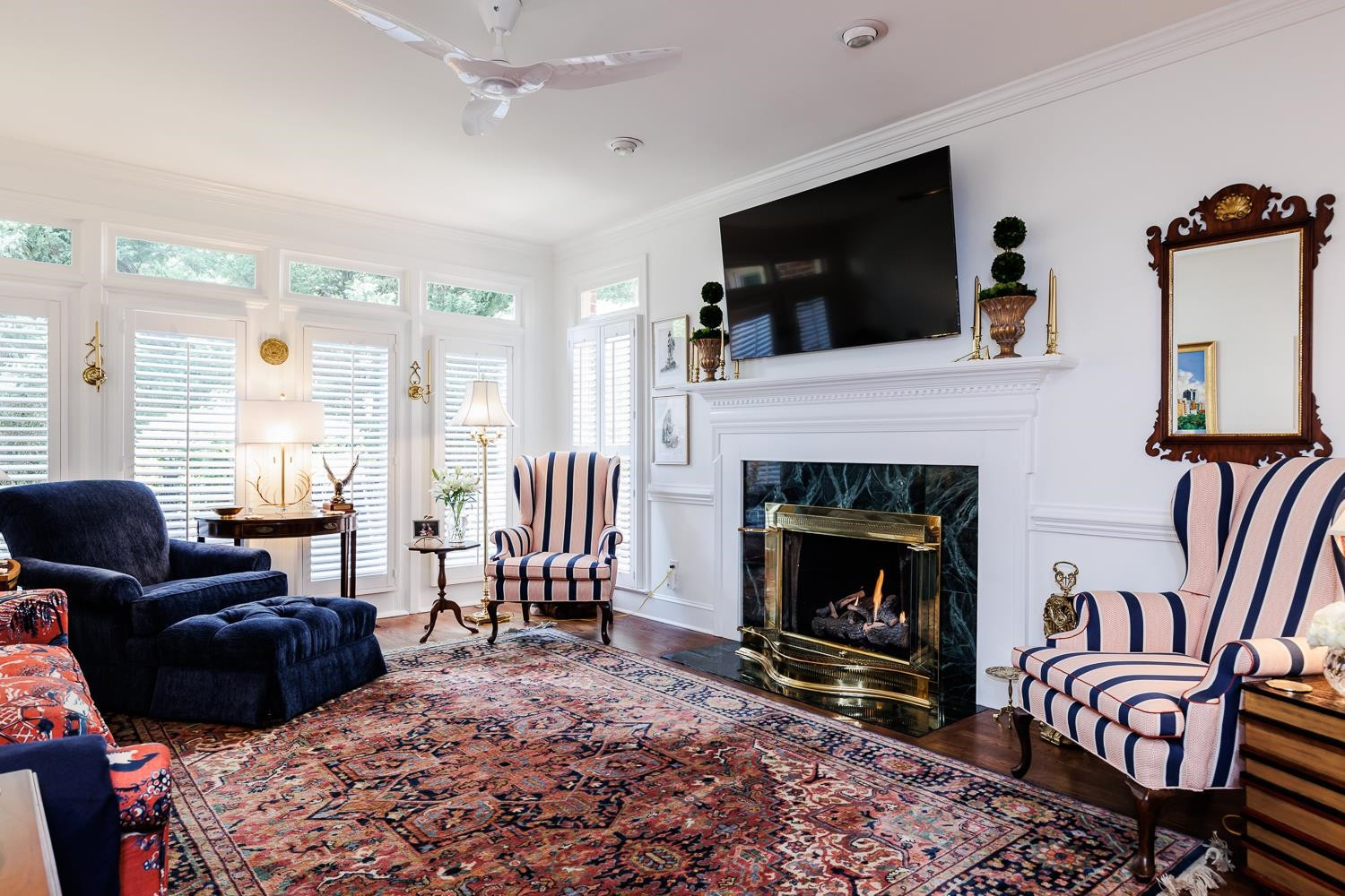 3359 Ridgecrest Court Raleigh, NC 27607 - Photo 8 of 37 a living room with furniture fireplace and flat screen tv