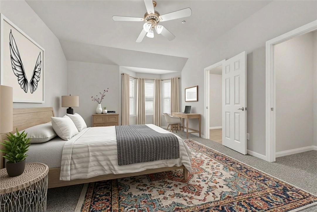 1198 Jones-Butler Road, Unit 907 College Station, TX 77840 - Photo 12 of 23 a bedroom with a large bed and a chandelier