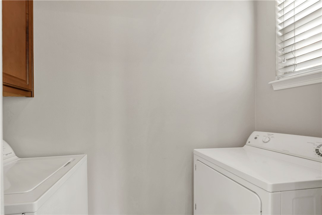 1198 Jones-Butler Road, Unit 907 College Station, TX 77840 - Photo 19 of 23 a utility room with dryer and washer