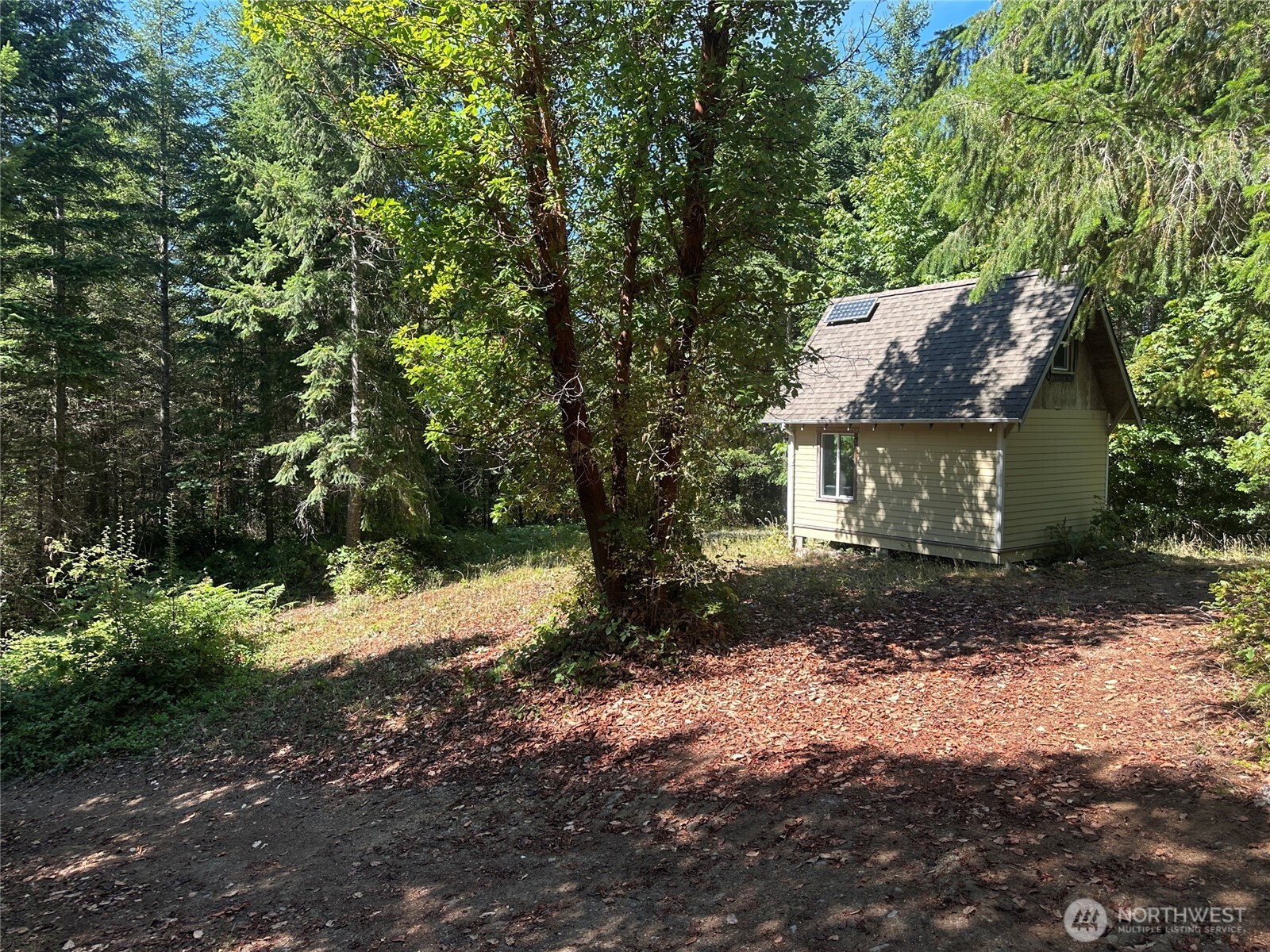 22222-nhn East Quilcene Road Quilcene, WA 98376 - Photo 2 of 39 a view of a house with a yard