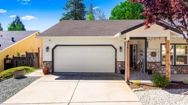 a view of outdoor space and front view of a house