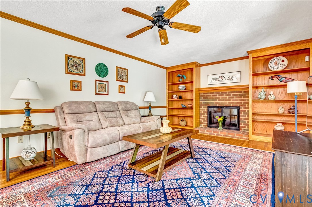 11494 Riveredge Road Doswell, VA 23047 - Photo 6 of 50 Custom Built-ins & wood burning fireplace w/custom