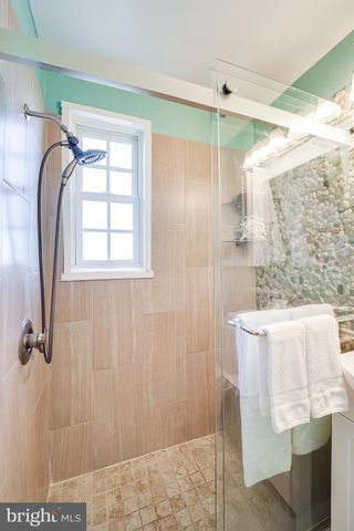 a front view of a building with garden