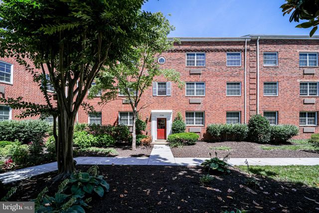 a fire hydrant in the middle of a field