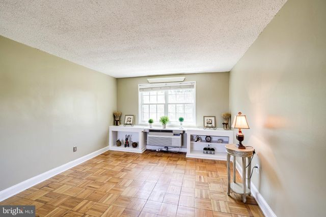 a room with furniture and window