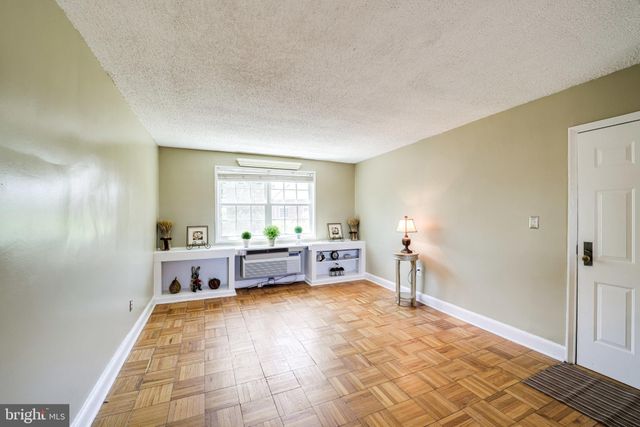a view of a room with a sink and a window