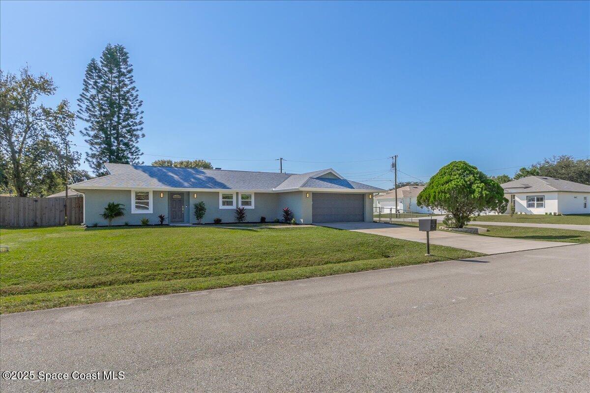 1050 Emerald Road Southeast Palm Bay, FL 32909 - Photo 3 of 63 02-1050-Emerald-100