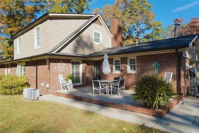 a view of a house with patio