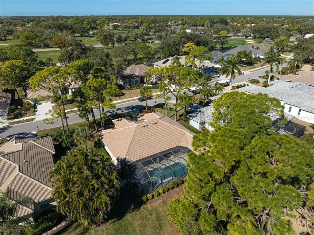 2115 Muskogee Trail Nokomis, FL 34275 - Photo 34 of 39 an aerial view of residential houses with outdoor space
