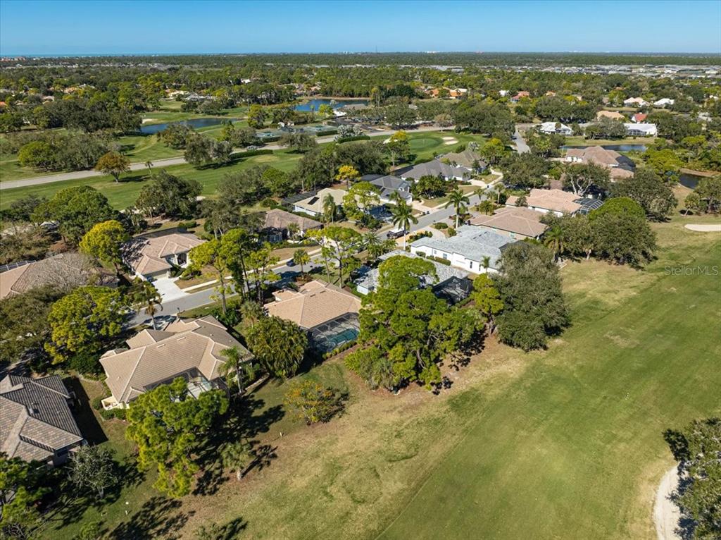 2115 Muskogee Trail Nokomis, FL 34275 - Photo 35 of 39 an aerial view of residential houses with outdoor space