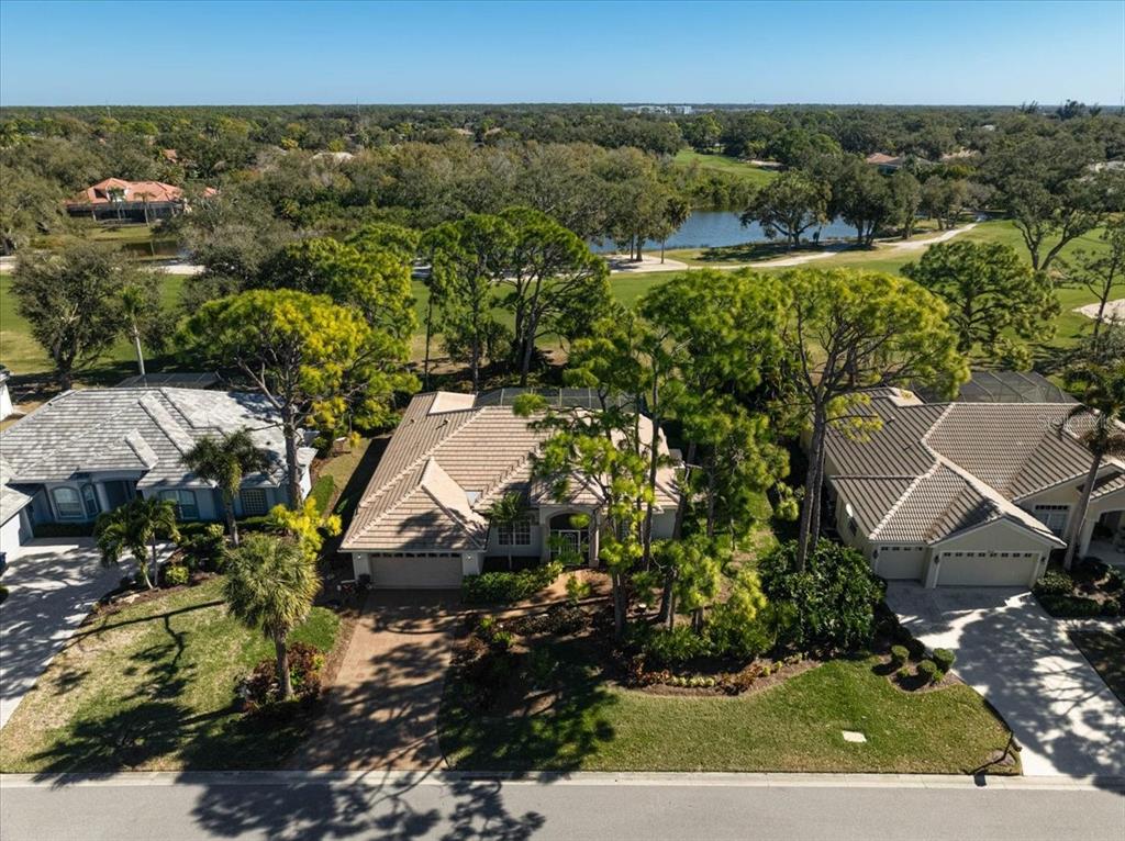 2115 Muskogee Trail Nokomis, FL 34275 - Photo 39 of 39 an aerial view of a residential houses with outdoor space and street view