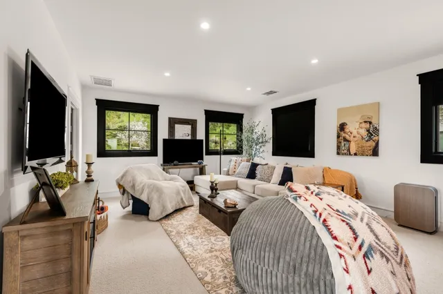 a view of a room with racks on the wall